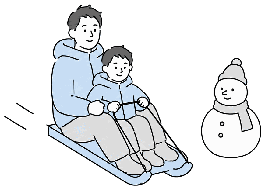 そりで雪の斜面をすべる親子
